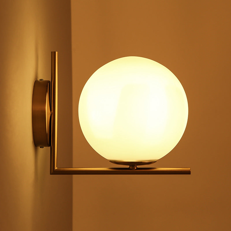 VALORA Mid-Century Modern Brass Wall Sconce with Opal Glass Globe - Styyler