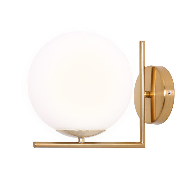 VALORA Mid-Century Modern Brass Wall Sconce with Opal Glass Globe - Styyler