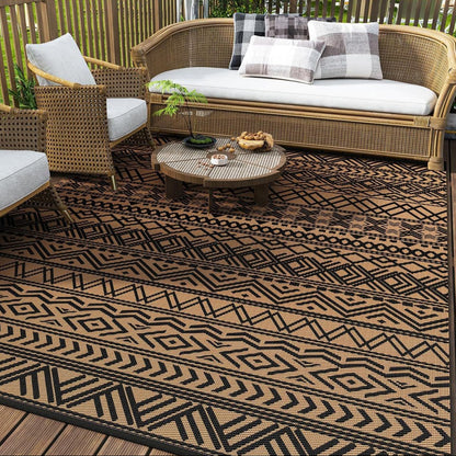 Enhance your patio with the Geometra Washable Outdoor Rug, featuring a stylish black and coffee pattern. Perfect for any space!