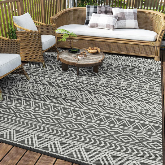 Transform your patio with the Geometra Washable Outdoor Rug, featuring a stylish endless pattern and durable design.